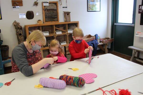 mother and children making valentines