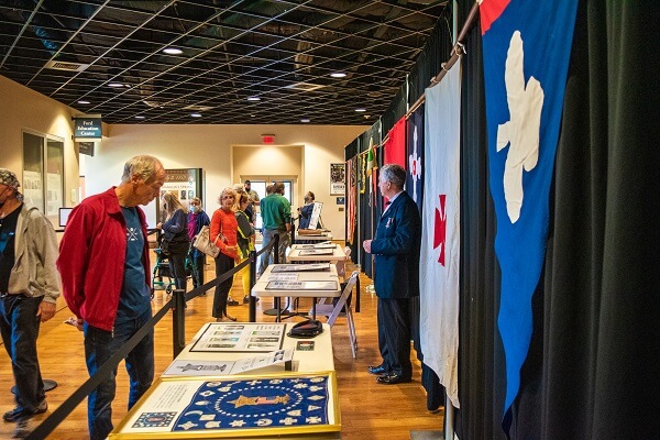 visitors view Civil War Union flags display